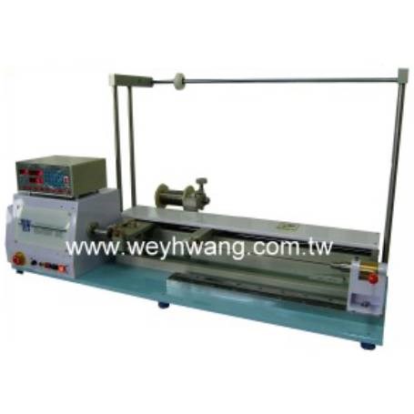 Long traverse coil winding machine