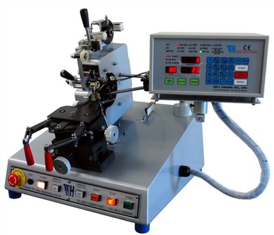 Toroid winding machine