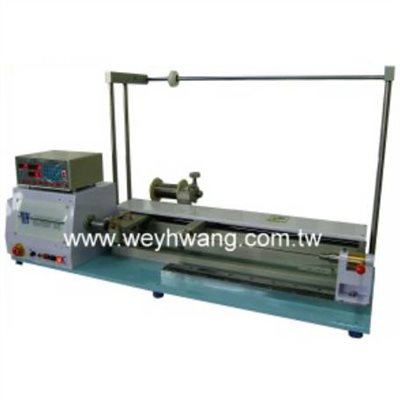 Long traverse coil winding machine